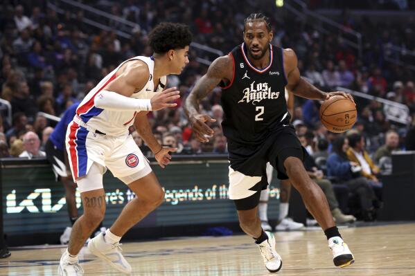 'Los Angeles Clippers forward Kawhi Leonard, right, is defended by Detroit Pistons guard Killian Hayes during the first half of an NBA basketball game Thursday, Nov. 17, 2022, in Los Angeles. (AP Photo/Raul Romero Jr.)