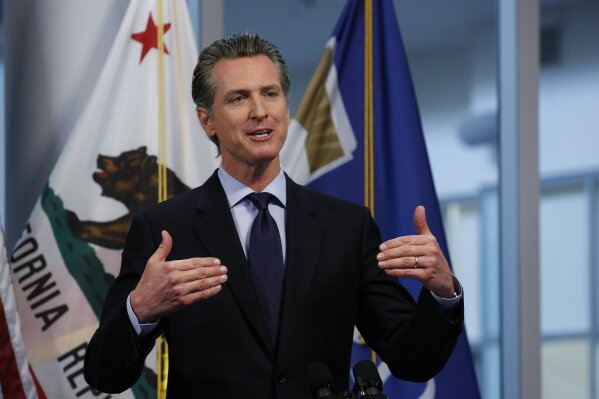 FILE — In this April 9, 2020 file photo Gov. Gavin Newsom discusses the state's response to the coronavirus during his daily news briefing at the Governor's Office of Emergency Services in Rancho Cordova, Calif. Newsom said Monday, April 13, 2020 that he will announce a detailed plan on Tuesday for how the state will eventually lift coronavirus restrictions. (AP Photo/Rich Pedroncelli, File )