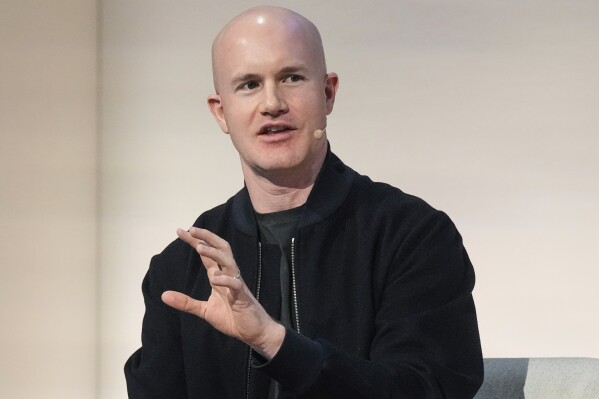 Brian Armstrong, Co-founder and CEO of Coinbase, participates in the State of Crypto Summit, in New York, June 12, 2025. (AP Photo/Richard Drew, File)