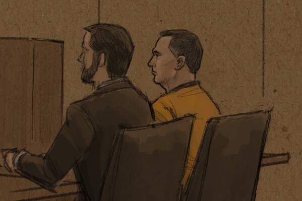 In this courtroom sketch, Vance Boelter, right, who is charged with killing one Minnesota lawmaker and wounding another, is seen at a federal court hearing Monday, June 16, 2025, in St. Paul, Minn. (Cedric Hohnstadt via AP)