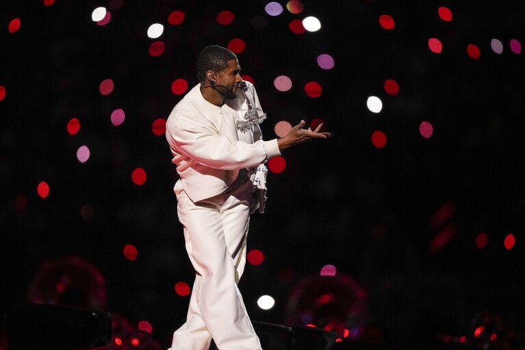 Usher performs during halftime of the NFL Super Bowl 58 football game between the San Francisco 49ers and the Kansas City Chiefs Sunday, Feb. 11, 2024, in Las Vegas. (AP Photo/Brynn Anderson)