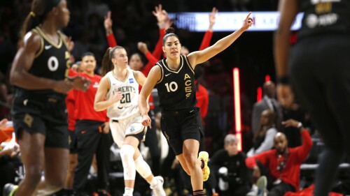 Las Vegas Aces guard Kelsey Plum (10) celebrates a 3-point basket against the New York Liberty during the first half of a WNBA basketball game Thursday, June 29, 2023, in Las Vegas. (Steve Marcus/Las Vegas Sun via AP)