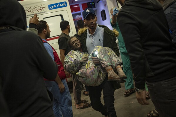 A Palestinian wounded in Israeli bombardment of the Gaza Strip is brought to a hospital in Khan Younis, Wednesday, Nov. 15, 2023. ( AP Photo/Fatima Shbair)