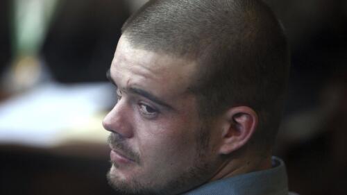 FILE - Joran van der Sloot looks back from his seat after entering the courtroom for the continuation of his murder trial at San Pedro prison in Lima, Peru, Jan. 11, 2012. The Peruvian government said on Monday, June 5, 2023 that Van der Sloot, the main suspect in the unsolved 2005 disappearance of American student Natalee Holloway, will be extradited this week to the United States. (AP Photo/Karel Navarro, File)