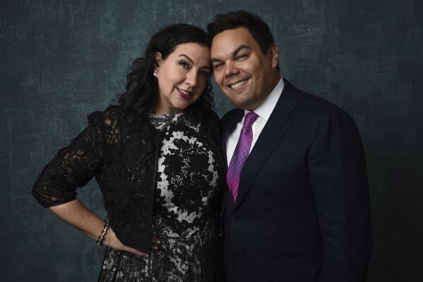 Kristen Anderson-Lopez, left, and Robert Lopez pose for a portrait at the 92nd Academy Awards Nominees Luncheon at the Loews Hotel on Monday, Jan. 27, 2020, in Los Angeles. (AP Photo/Chris Pizzello)