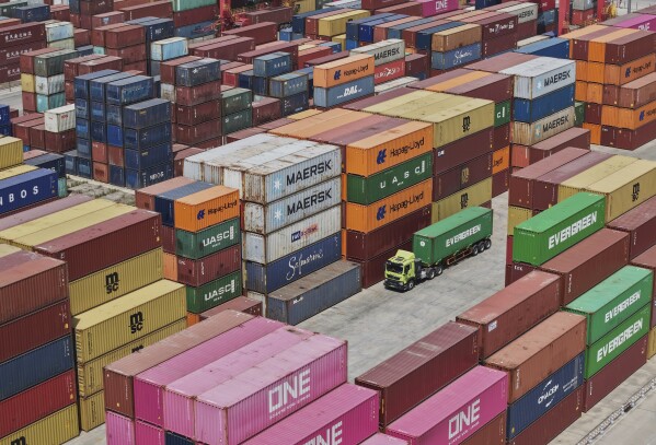 An aerial view of the Xiasha container terminal on a channel in Hangzhou in the province of Zhejiang in eastern China Sunday, April 6, 2025. (Chinatopix via AP)