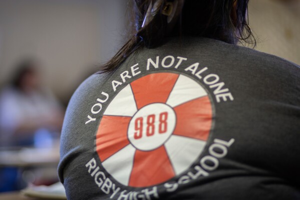 This image provided by Idaho Education News shows a student wearing a Hope Squad shirt at Rigby High School in Rigby, Idaho on Wednesday, Feb. 5, 2025. (John Roark/Idaho Education News via AP)