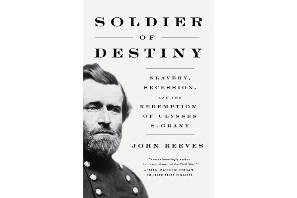 This cover image released by Pegasus Books shows "Soldier of Destiny: Slavery, Secession, and the Redemption of Ulysses S. Grant" by John Reeves. (Pegasus Books via AP)