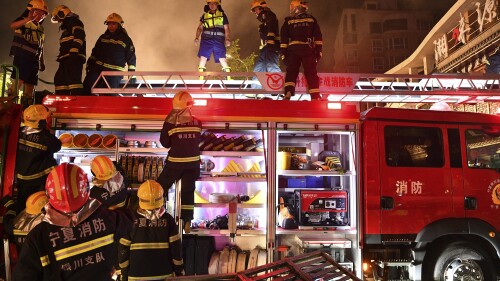 In this photo released by Xinhua News Agency, firefighters work at the site of an explosion at a restaurant in Yinchuan, northwest China's Ningxia Hui Autonomous Region Wednesday, June 21, 2023. Cooking gas caused a massive explosion at a barbecue restaurant in northwestern China killed dozens and injured some, Chinese authorities said Thursday. (Wang Peng/Xinhua via AP)