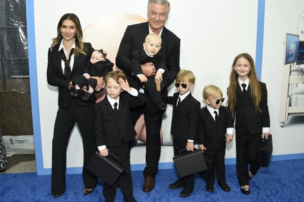 FILE - Actor Alec Baldwin, center, poses with his wife, Hilaria Baldwin, and six of their children at the world premiere of "The Boss Baby: Family Business" in New York on June 22, 2021. (Photo by Evan Agostini/Invision/AP, File)