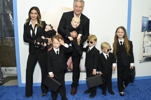 FILE - Actor Alec Baldwin, center, poses with his wife, Hilaria Baldwin, and six of their children at the world premiere of 