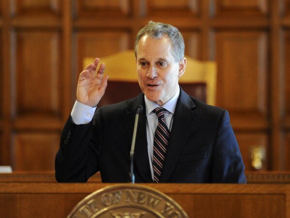 
              FILE - In this May 5, 2015 file photo, New York State Attorney Eric T. Schneiderman speaks during a Law Day event at the Court of Appeals in Albany, N.Y. The former New York Attorney General used nearly $340,000 in cash donated to his scuttled re-election campaign to pay the high-powered Manhattan law firm that defended him after he resigned amid allegations that he abused several women, according to newly filed campaign finance records reviewed by The Associated Press. Although the practice is legal, reform activists say Schneiderman and other politicians are exploiting lax campaign finance rules. (AP Photo/Hans Pennink, File)
            