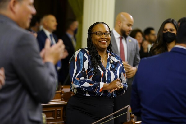 FILE - Assemblywoman Lori Wilson, D-Suisun City, receives applause as she is introduced during an Assembly session in Sacramento, Calif., on April 7, 2022. Lawmakers on Wednesday, Sept. 6, 2023. debated legislation that would require courts to consider whether a parent affirms their child's gender identity in custody introduced by Assemblywoman Wilson and other cases. It was one of dozens of bills that got a vote in the Legislature as lawmakers speed toward a Sept. 14 deadline. (AP Photo/Rich Pedroncelli, File)
