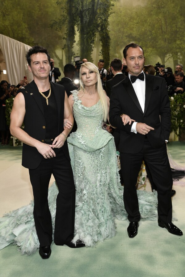 Andrew Scott, from left, Donatella Versace, and Jude Law attend The Metropolitan Museum of Art's Costume Institute benefit gala celebrating the opening of the "Sleeping Beauties: Reawakening Fashion" exhibition on Monday, May 6, 2024, in New York. (Photo by Evan Agostini/Invision/AP)