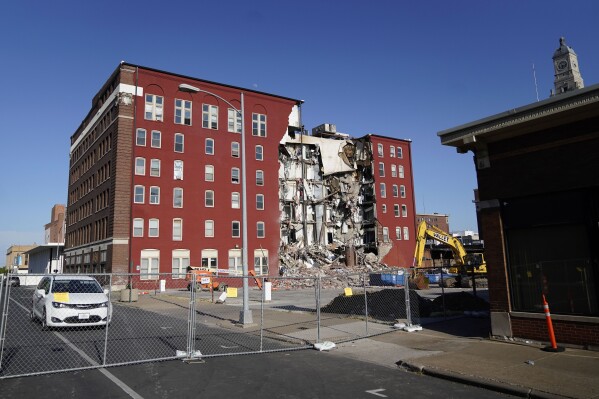 FILE - An apartment building that partially collapsed two days earlier is seen, Tuesday, May 30, 2023, in Davenport, Iowa. Iowa's health agency said Monday, July 31, 2023, that three men killed in the collapse more than two months ago died of blunt-force injuries and asphyxiation. (AP Photo/Erin Hooley, File)
