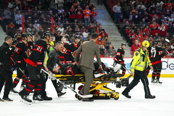 Ottawa Senators goaltender Anton Forsberg (31) is taken off the ice on a stretcher after getting injured during the third period of an NHL hockey game against the Edmonton Oilers in Ottawa on Saturday, Feb. 11, 2023. (Sean Kilpatrick/The Canadian Press via AP)