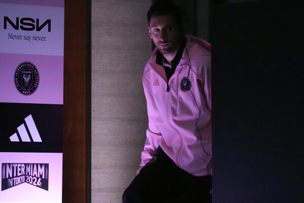 Inter Miami's Lionel Messi arrives for a press conference at a hotel, ahead of his team's friendly soccer match against Vissel Kobe in Tokyo, Tuesday, Feb. 6, 2024. (AP Photo/Shuji Kajiyama)