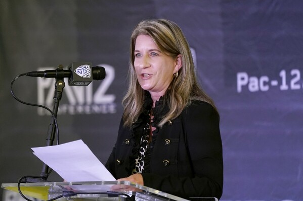 FILE - Pac-12 Senior Associate Commissioner Teresa Gould speaks during Pac-12 Conference NCAA college basketball media day Tuesday, Oct. 12, 2021, in San Francisco. The Pac-12 has promoted Teresa Gould to commissioner as the conference tries to navigate a murky future. 鈥淭eresa鈥檚 deep knowledge of collegiate athletics and unwavering commitment to student-athletes makes her uniquely qualified to help guide the Pac-12 Conference during this period of unprecedented change in college sports,鈥� Washington State University President and Pac-12 Board of Directors chair Kirk Schulz said in a statement on Monday, Feb.19, 2024. (AP Photo/Jeff Chiu, File)