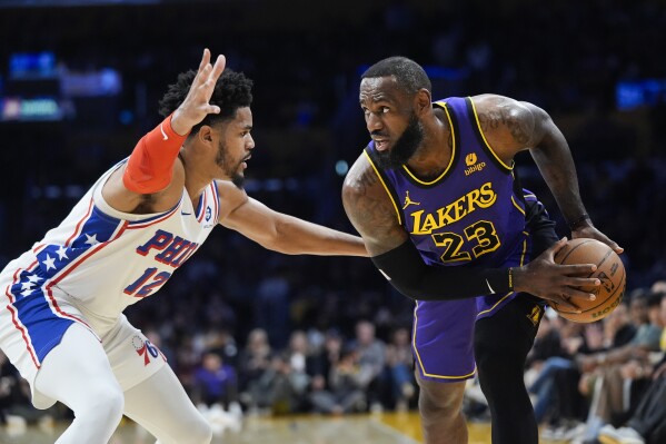 Anthony Davis, LeBron James lead 4th-quarter charge as the Lakers hold off  Philadelphia 101-94