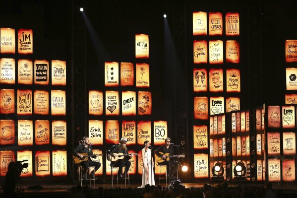 The Brothers Osborne, from left, Maren Morris and Eric Church perform at the 60th annual Grammy Awards at Madison Square Garden on Sunday, Jan. 28, 2018, in New York. (Photo by Matt Sayles/Invision/AP)