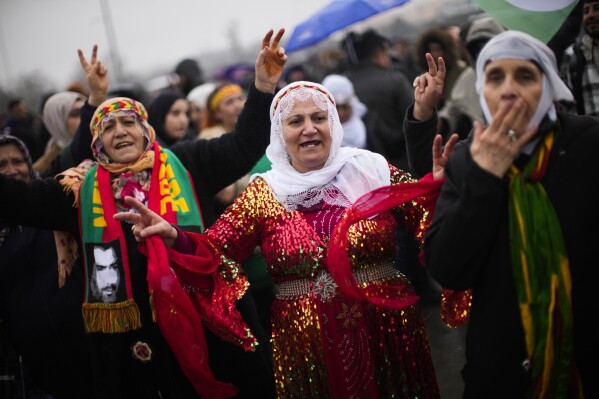 Kurdish women dance during the Newroz celebrations marking the start of spring in Istanbul, Turkey, Sunday, March 19, 2023. (AP Photo/Francisco Seco, File)