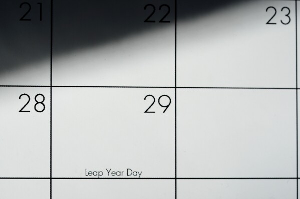 February, 29, otherwise know as leap year day, is shown on a calendar Sunday, Feb. 25, 2024, in Overland Park, Kan. Because it actually takes a bit longer than 365 days for the Earth to revolve around the sun, an extra day is added to the calendar in February every four years to make up make up for the that extra time. (AP Photo/Charlie Riedel)
