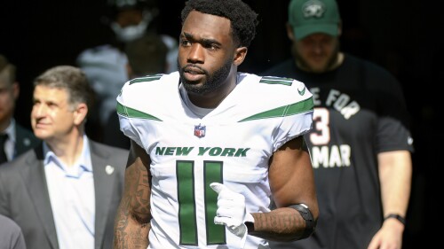 FILE - New York Jets wide receiver Denzel Mims (11) walks onto the field before an NFL football game against the Miami Dolphins, Sunday, Jan. 8, 2023, in Miami Gardens, Fla. The New York Jets will release wide receiver Denzel Mims if they don't find a trade partner for the disappointing 2020 second-round draft pick, two people with knowledge of the situation said Wednesday, July 19. (AP Photo/Doug Murray, File)