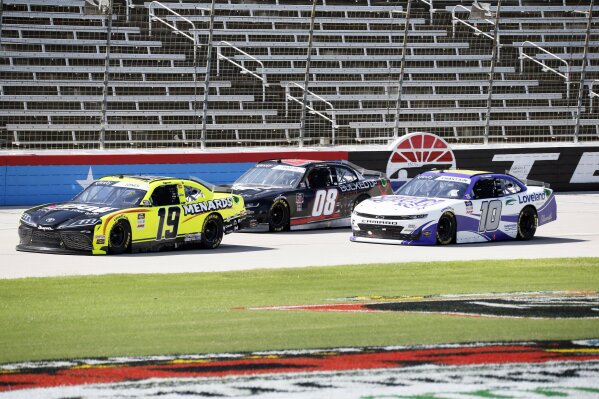 Brandon Jones (19), Joe Graf Jr. (08) and Ross Chastain (10) drive down the front stretch during a NASCAR Xfinity Series auto race at Texas Motor Speedway in Fort Worth, Texas, Saturday, July 18, 2020. (AP Photo/Ray Carlin)
