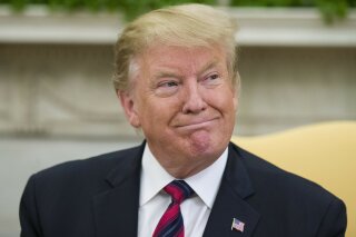 President Donald Trump smiles during a meeting with Slovak Prime Minister Peter Pellegrini in the Oval Office of the White House, Friday, May 3, 2019, in Washington. (AP Photo/Alex Brandon)