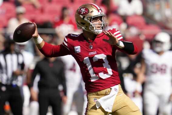 San Francisco 49ers quarterback Brock Purdy (13) passes against the Arizona Cardinals during the second half of an NFL football game in Santa Clara, Calif., Sunday, Oct. 1, 2023. (AP Photo/Godofredo A. Vásquez)