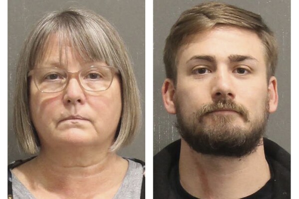 FILE - This booking photo released by the Metro Nashville, Tenn., Police Department, shows Lisa Marie Eisenhart, left, and her son Eric Gavelek Munchel. The Tennessee bartender who carried plastic zip tie handcuffs and a stun gun into the Senate gallery on Jan. 6, 2021, where he was captured in one the most widely shared photos of the U.S. Capitol riot, was sentenced Sept. 8, 2023, to nearly five years in prison. Eisenhart was also sentenced Friday to two-and-a-half years in prison.(Metro Nashville Police Department via AP)