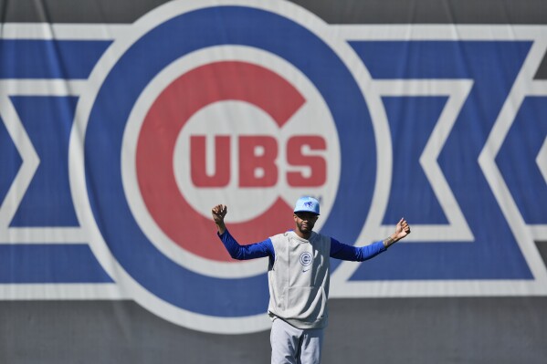 Chicago Cubs' Carl Edwards Jr. stretches during a baseball spring training workout, Saturday, Feb. 17, 2024, in Mesa, Ariz. (APPhoto/Matt York)
