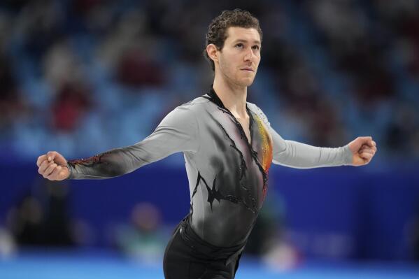 Jason Brown, of the United States, competes in the men's free skate program during the figure skating event at the 2022 Winter Olympics, Thursday, Feb. 10, 2022, in Beijing. (AP Photo/Natacha Pisarenko)