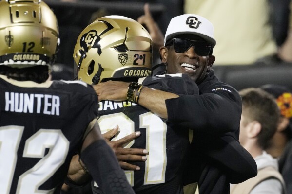 Deion and Shedeur Sanders have Colorado rolling toward bowl eligibility  after taking over 1-11 team, World