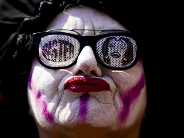 Sister Castrata Sigmata of the Sisters of Perpetual Indulgence, Abbey of St. Joan, poses for a photo during the annual Seattle Pride Parade, Sunday, June 25, 2023, in Seattle. (AP Photo/Lindsey Wasson)