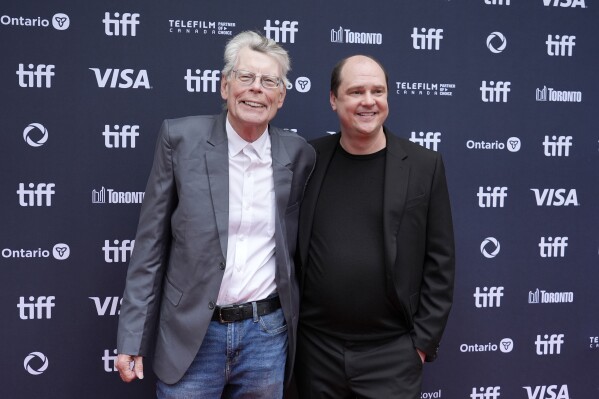 Stephen King, left, and Mike Flanagan appear at the premiere of "The Life of Chuck" during the Toronto International Film Festival in Toronto on Sept. 6, 2024. (AP Photo/Chris Pizzello, File)