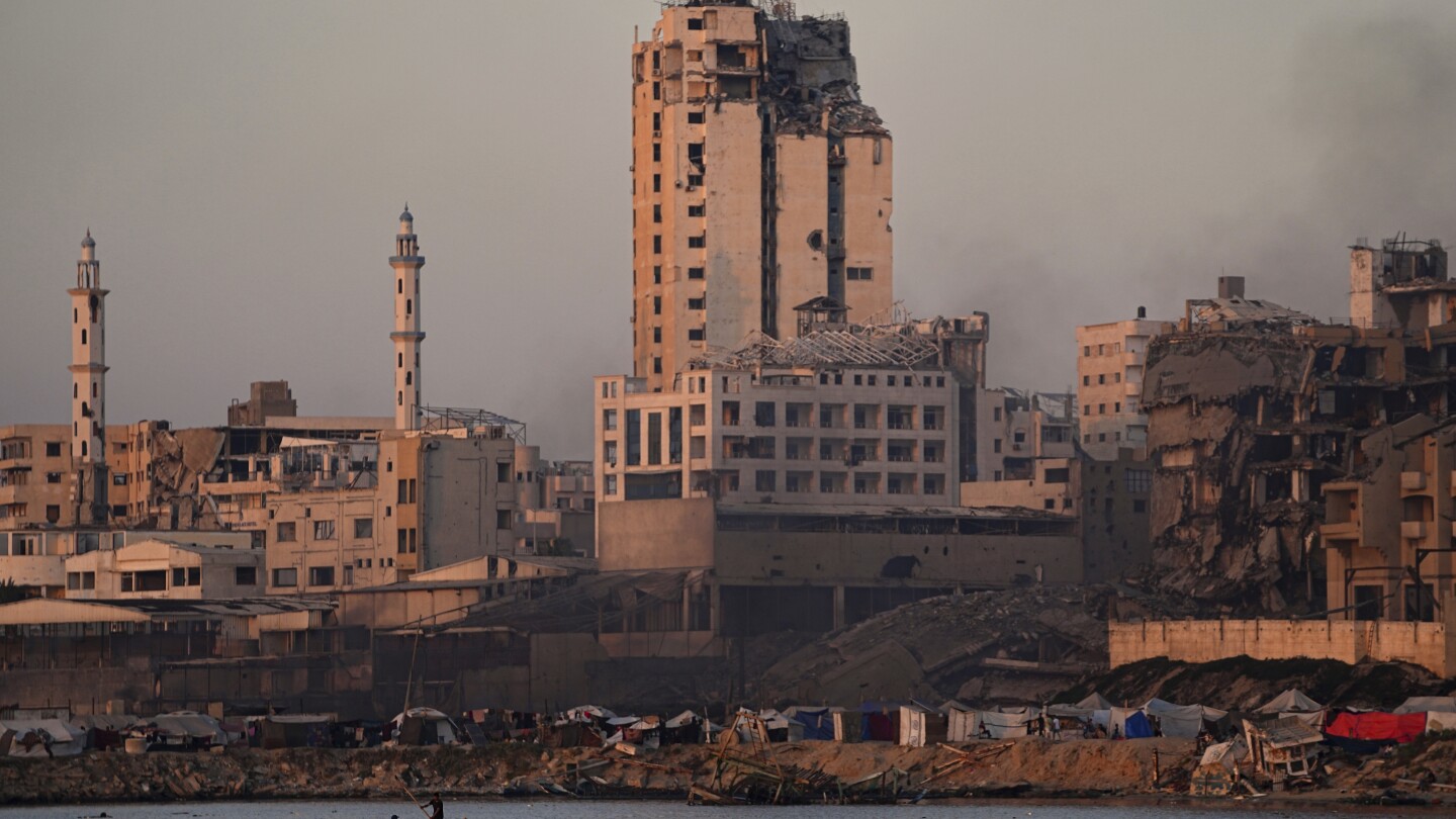 Israeli strikes on Gaza kill at least 16 as war rages on after the opening of a new front with Iran