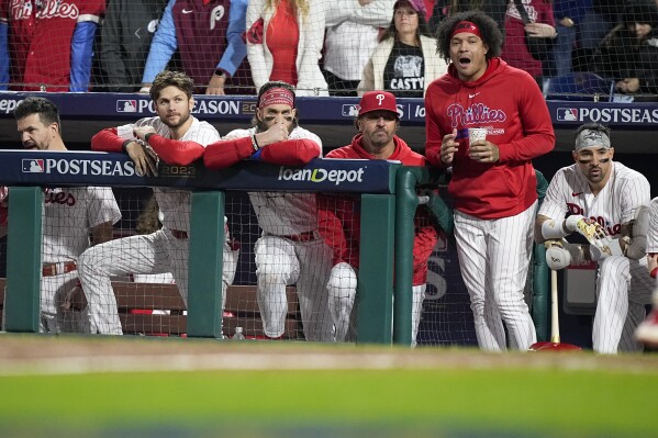 Members of the Philadelphia Phillies celebrate in the locker room