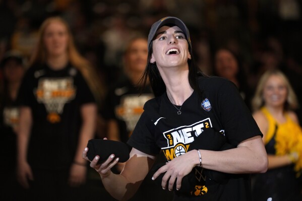 Iowa guard Caitlin Clark reacts to fans during an Iowa women's basketball team celebration, Wednesday, April 10, 2024, in Iowa City, Iowa. Iowa lost to South Carolina in the Final Four college basketball championship game of the women's NCAA Tournament on Sunday. (AP Photo/Charlie Neibergall)