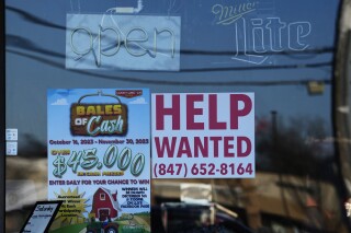 A "Help Wanted" sign is displayed at a restaurant in Buffalo Grove, Ill., Thursday, Jan. 18, 2024. On Thursday, Feb. 22, 2024, the Labor Department reports on the number of people who applied for unemployment benefits last week. (AP Photo/Nam Y. Huh)