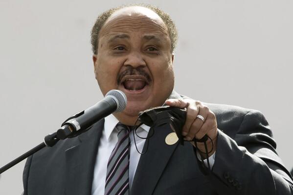 Martin Luther King III, with the Deliver For Voting Rights organization, wraps up his speech at the Eastlake Park Amphitheater in Phoenix on Saturday, Jan. 15, 2022. As the nation prepares to mark the birthday of the Rev. Martin Luther King Jr., some members of his family are spending it in conservative-leaning Arizona to mobilize support for languishing federal voting rights legislation. (Zac BonDurant/The Arizona Republic via AP)