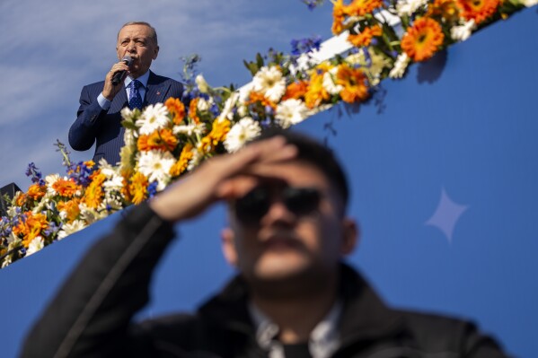 Turkish President and leader of the Justice and Development Party, or AKP, Recep Tayyip Erdogan, gives a speech during a campaign rally ahead of nationwide municipality elections, in Istanbul, Turkey, Sunday, March 24, 2024. On Sunday, millions of voters in Turkey head to the polls to elect mayors and administrators in local elections which will gauge President Recep Tayyip Erdogan’s popularity as his ruling party tries to win back key cities it lost five years ago. (AP Photo/Francisco Seco)