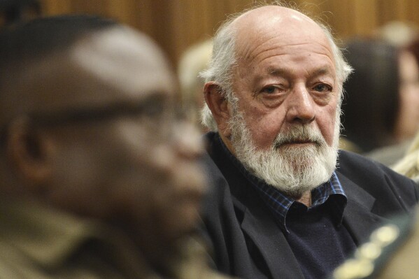 FILE - Barry Steenkamp, the father of Reeva Steenkamp sits in the High Court for the re-sentencing proceedings of Oscar Pistorius, in Pretoria, South Africa, Monday, June 13, 2016. A family spokesperson says the father of Reeva Steenkamp, the woman who was fatally shot by Olympic runner Oscar Pistorius, has died. He was 80. Family lawyer and spokesperson Tania Koen confirmed Barry Steenkamp’s death to The Associated Press on Friday, Sept. 15, 2023. (Phill Magakoe, Pool Photo via AP, File)