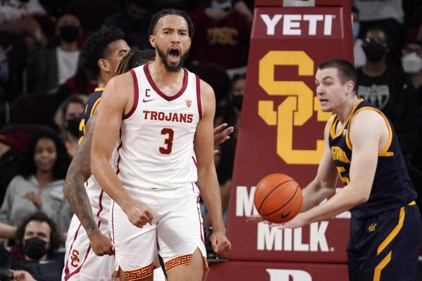 Southern California forward Isaiah Mobley, left, celebrates after scoring as California forward Grant Anticevich looks on during the first half of an NCAA college basketball game Saturday, Jan. 29, 2022, in Los Angeles. (AP Photo/Mark J. Terrill)