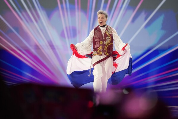 A small lasagna from Croatia stands during the flag display for the Eurovision Song Contest grand final in Malmö, Sweden, Saturday, May 11, 2024. (AP Photo/Martin Meissner)