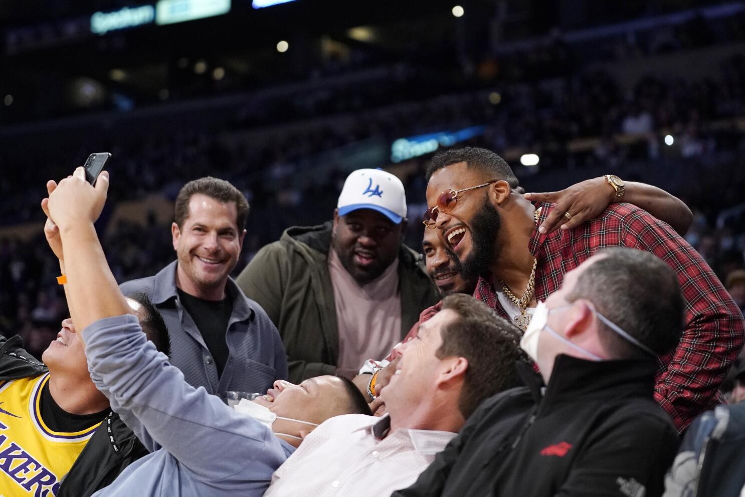 Los Angeles Lakers forward LeBron James, left, hugs Aaron Donald of the Los  Angeles Rams after the Lakers defeated the Utah Jazz 106-101in an NBA  basketball game Wednesday, Feb. 16, 2022, in