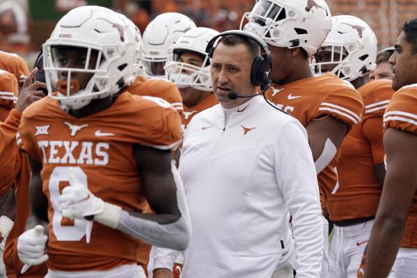 FILE - Texas head coach Steve Sarkisian calls a play from the sidelines during the first half of an NCAA college football game against Kansas State in Austin, Texas, Friday, Nov. 26, 2021. Top-ranked Alabama (1-0) and Texas (1-0) meet for the first time since 2009 on Saturday. (AP Photo/Chuck Burton, File)
