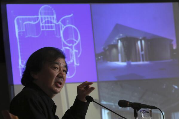 FILE - Japanese architect Shigeru Ban speaks during a press conference in Tokyo, April 2, 2014. Ban was announced as the winner of the prestigious Spanish Princess of Asturias Award for Concord on Thursday, June 23, 2022. (AP Photo/Eugene Hoshiko, File)
