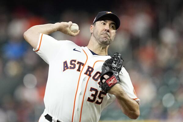 Houston Astros starting pitcher Justin Verlander throws against the Philadelphia Phillies during the first inning of a baseball game Tuesday, Oct. 4, 2022, in Houston. (AP Photo/David J. Phillip)