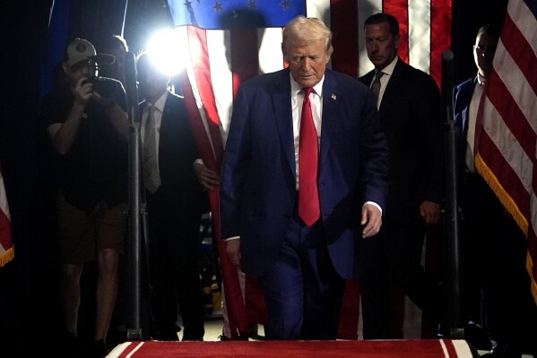 Republican presidential nominee former President Donald Trump arrives to speak at a campaign rally at the Mohegan Sun Arena at Casey Plaza, Saturday, Aug. 17, 2024, in Wilkes-Barre, Pa. (AP Photo/Carolyn Kaster)